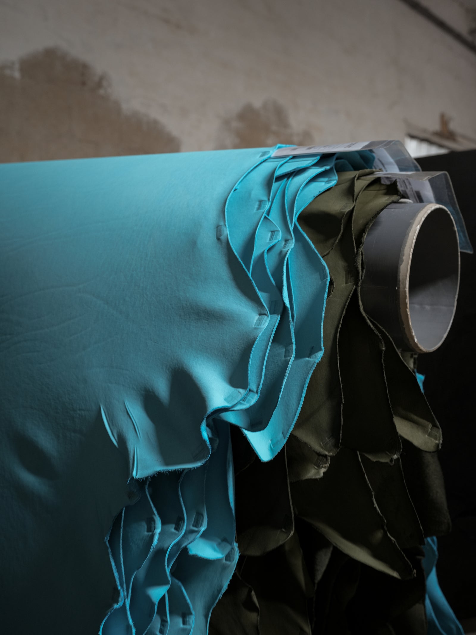 Hides drying over the rails at the tannery