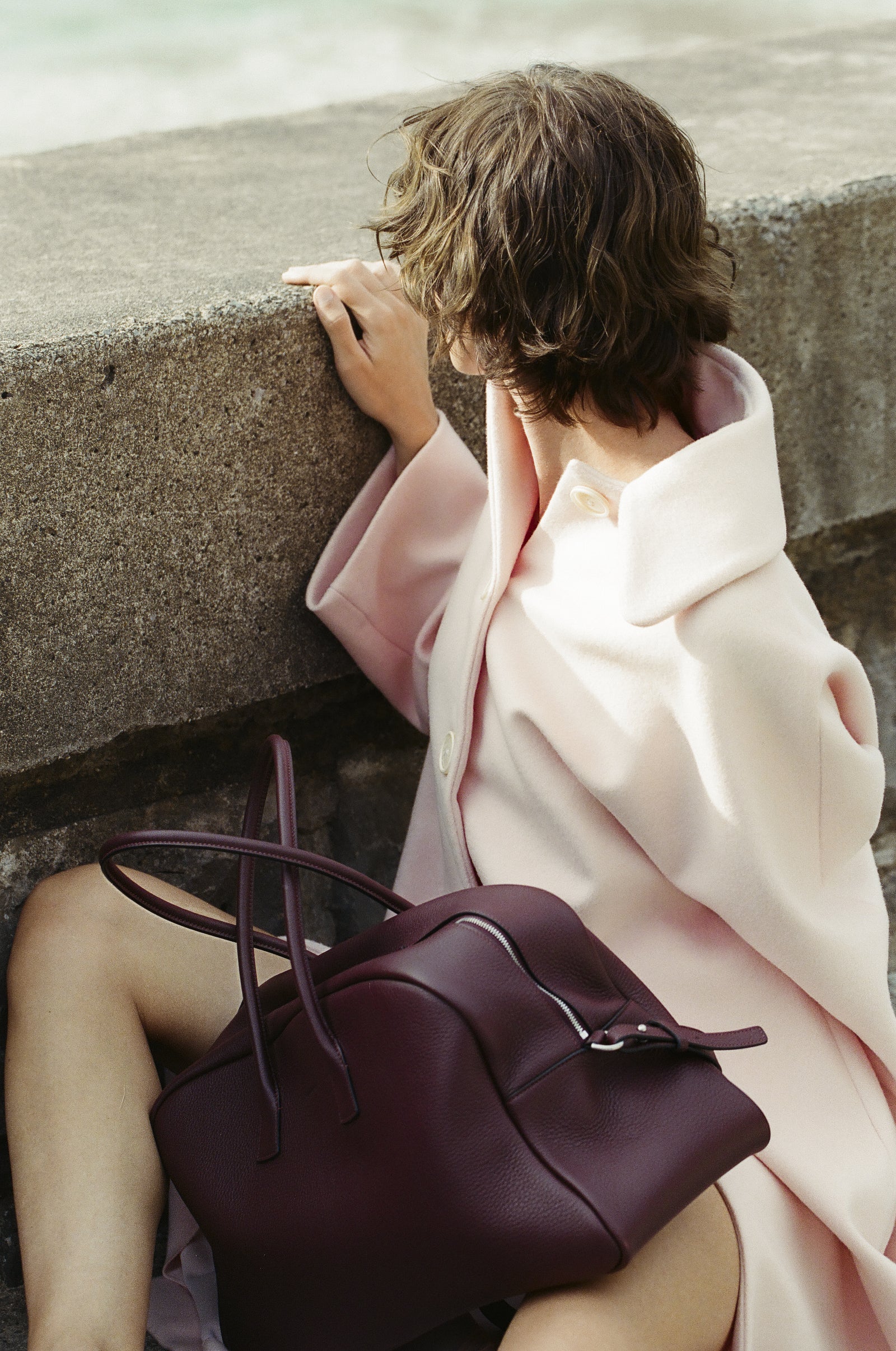 LUMA in Black Cherry by the sea