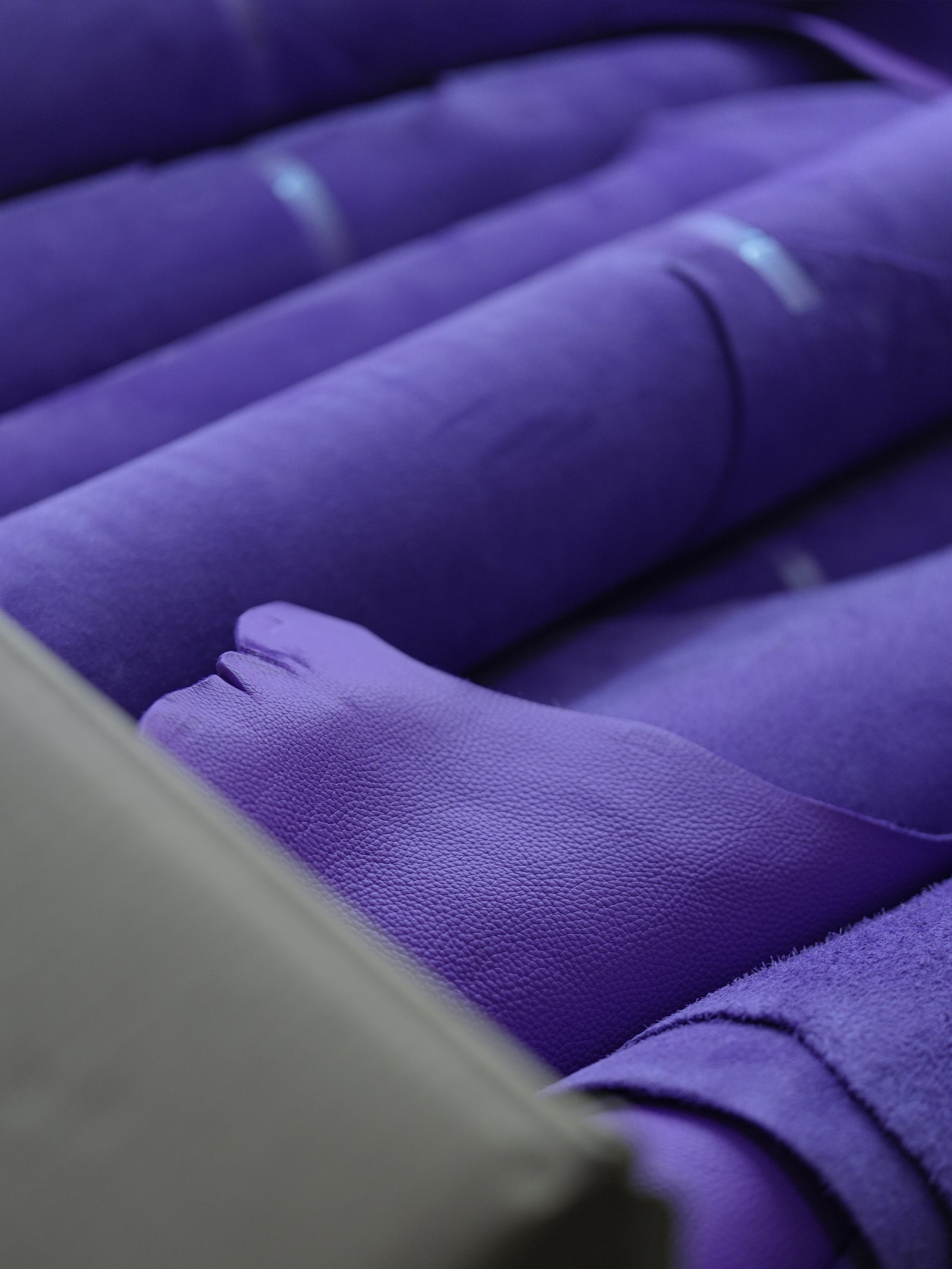 Rolls of violet Taurillon leather
